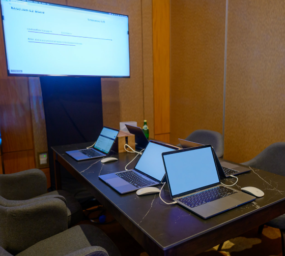 MacBook Pro workstations prepared for business meetings and workshops
