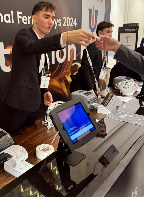 technology rental iPad Pro check-in kiosk used for attendee registration and badge collection at a conference
